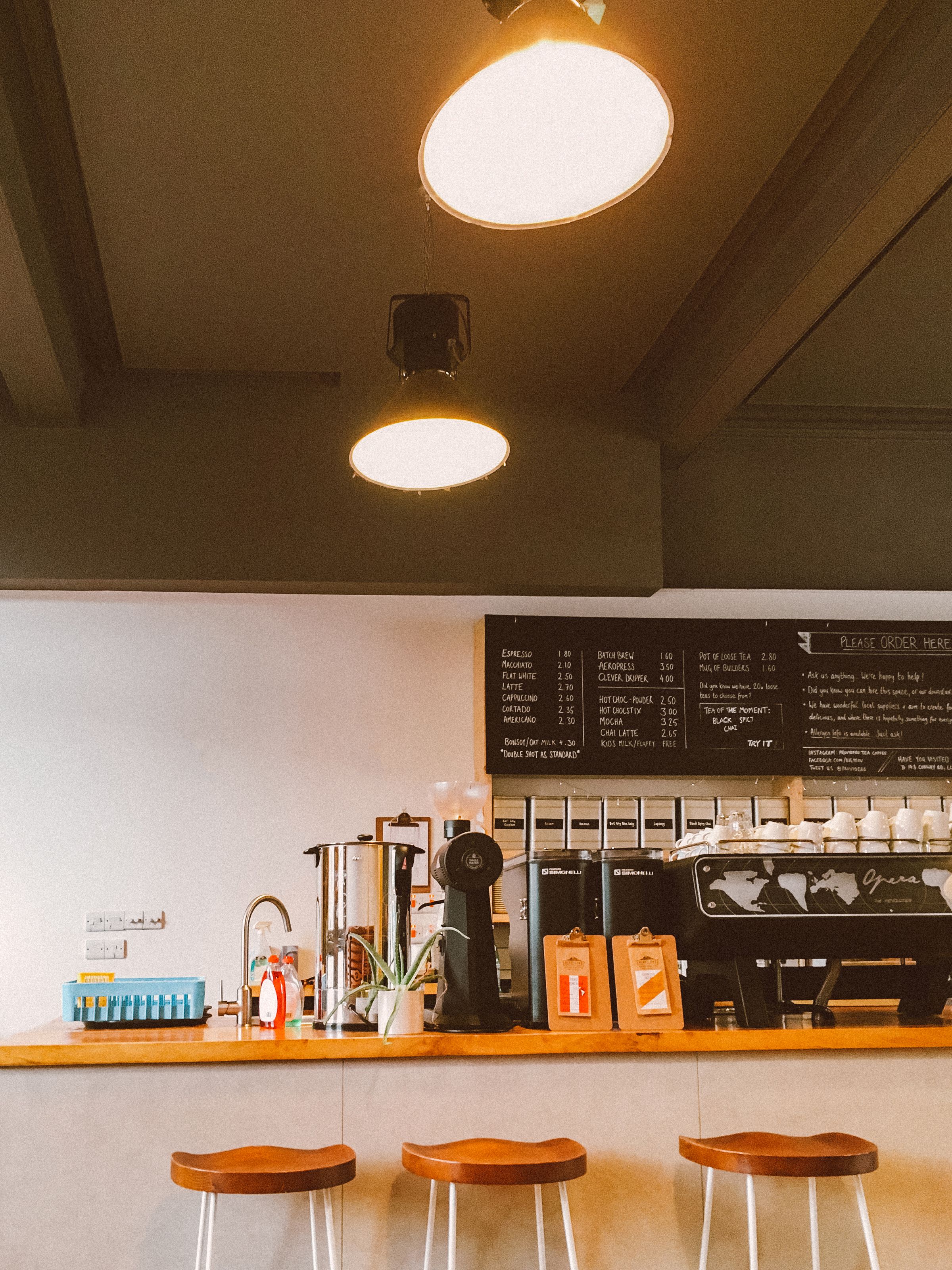 Warm coffee shop counter ready for morning service